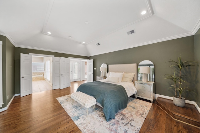 bedroom with recessed lighting, baseboards, visible vents, and wood finished floors