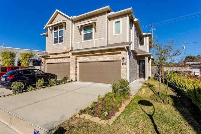 view of property featuring a garage, driveway, and stone siding