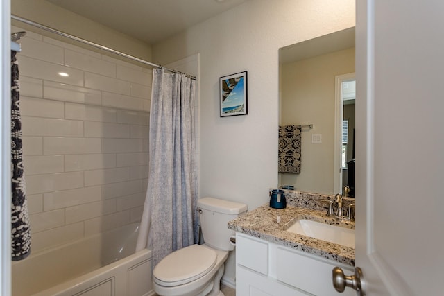 full bathroom featuring shower / bathtub combination with curtain, vanity, and toilet