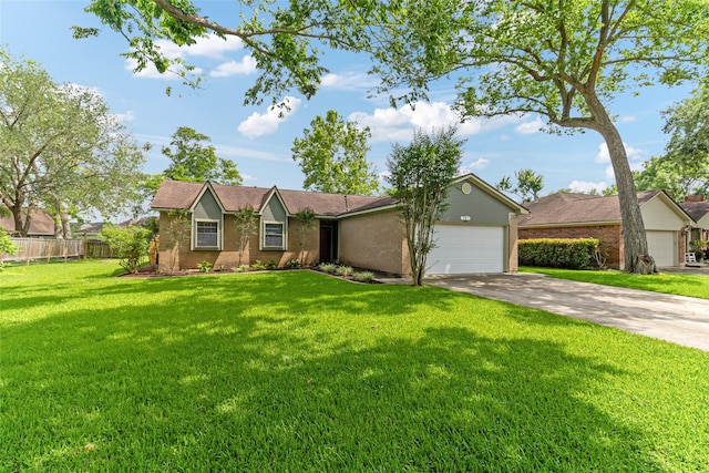 ranch-style house with fence, a front yard, driveway, and an attached garage