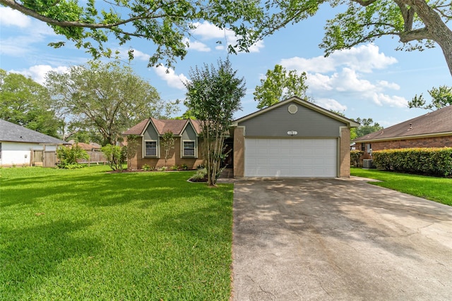 single story home featuring brick siding, fence, an outbuilding, driveway, and a front lawn