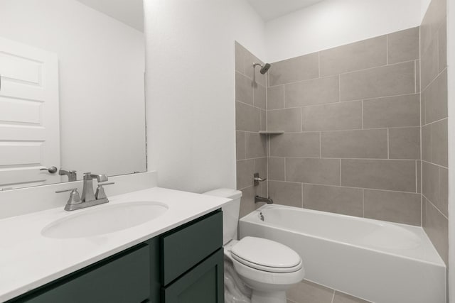bathroom with tile patterned floors, toilet, bathtub / shower combination, and vanity