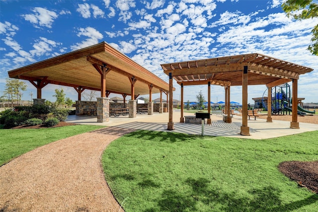 surrounding community featuring playground community, a gazebo, a yard, and a pergola