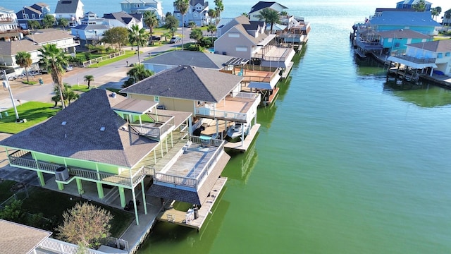 205 Bora Bora Dr, Tiki Island, TX 77554 - aerial view of residential area with a large body of water
