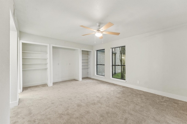 18118 Lakeside Ln, Houston, TX 77058 - unfurnished bedroom with light carpet, baseboards, and ceiling fan
