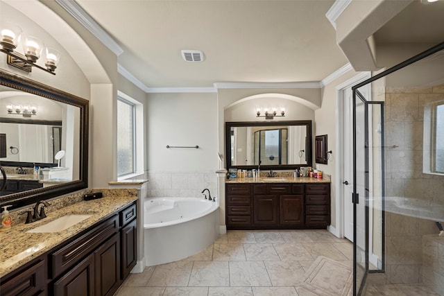 27803 Indigo Pointe Ln, Katy, TX 77494 - bathroom with a shower stall, ornamental molding, a bath, two vanities, and a chandelier