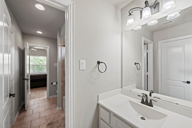 27803 Indigo Pointe Ln, Katy, TX 77494 - bathroom featuring vanity, tile patterned floors, ensuite bathroom, recessed lighting, and baseboards