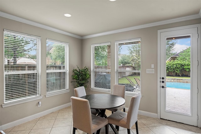 27803 Indigo Pointe Ln, Katy, TX 77494 - dining area featuring healthy amount of natural light, light tile patterned floors, baseboards, ornamental molding, and recessed lighting