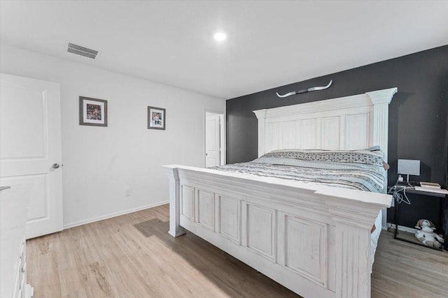 126 Spring Rose Dr, Magnolia, TX 77354 - bedroom featuring light wood-style floors and baseboards