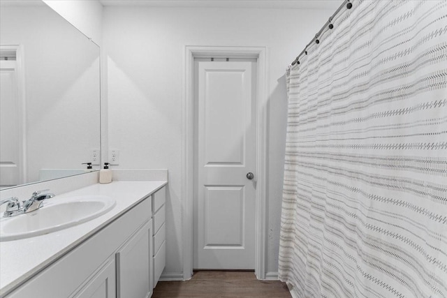 126 Spring Rose Dr, Magnolia, TX 77354 - full bathroom featuring vanity, wood finished floors, and curtained shower