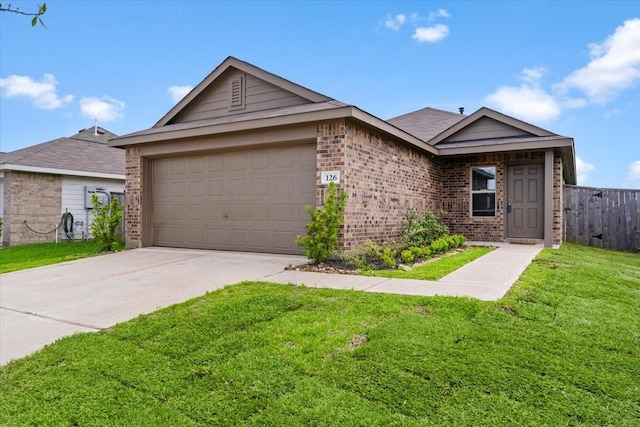 126 Spring Rose Dr, Magnolia, TX 77354 - ranch-style home featuring brick siding, a garage, and driveway