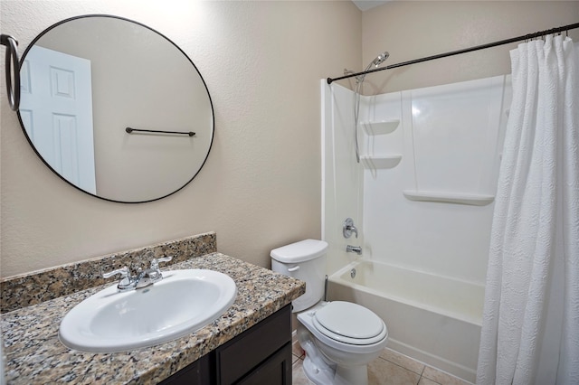 full bathroom featuring vanity, tile patterned floors, shower / bath combo with shower curtain, and toilet