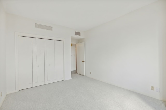 101 Westcott St Unit 1402, Houston, TX 77007 - unfurnished bedroom with carpet flooring and a closet