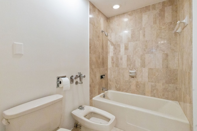 101 Westcott St Unit 1402, Houston, TX 77007 - bathroom featuring toilet, shower / bathtub combination, a bidet, and recessed lighting