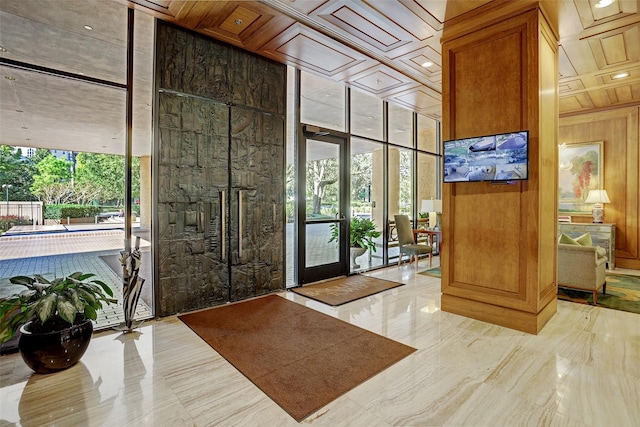 101 Westcott St Unit 1402, Houston, TX 77007 - lobby featuring floor to ceiling windows and wood walls