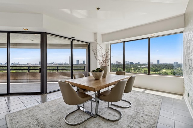 101 Westcott St Unit 1402, Houston, TX 77007 - tiled dining space featuring a skyline view