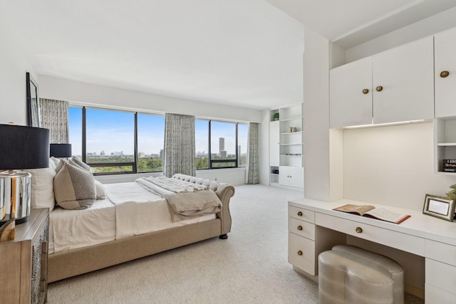 101 Westcott St Unit 1402, Houston, TX 77007 - bedroom with light colored carpet and a desk