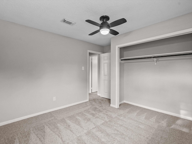 307 Binnacle Way, Crosby, TX 77532 - unfurnished bedroom with visible vents, a ceiling fan, a closet, baseboards, and carpet flooring