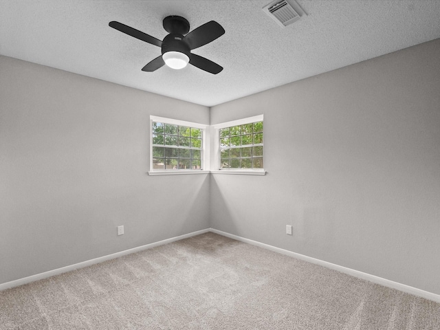 307 Binnacle Way, Crosby, TX 77532 - carpeted empty room featuring a textured ceiling, ceiling fan, visible vents, and baseboards