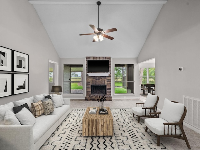 307 Binnacle Way, Crosby, TX 77532 - living area with visible vents, a fireplace, ceiling fan, high vaulted ceiling, and light colored carpet