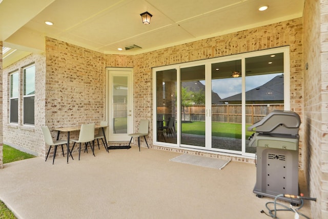 view of patio / terrace with fence and grilling area