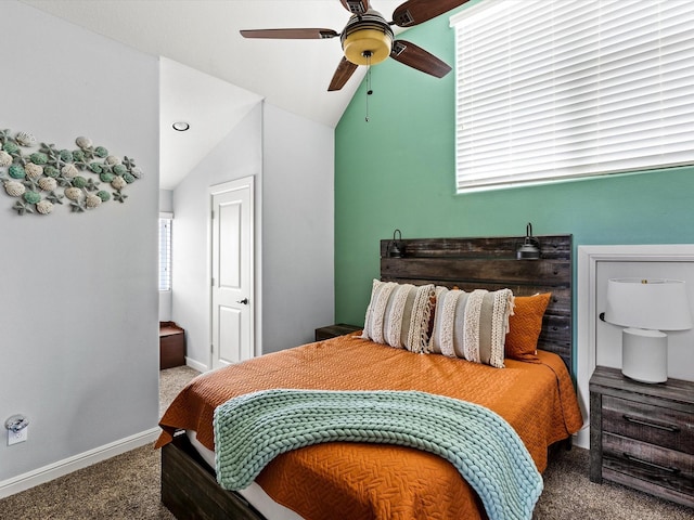 4138 Defender Ln, Galveston, TX 77554 - carpeted bedroom with a ceiling fan, lofted ceiling, and baseboards