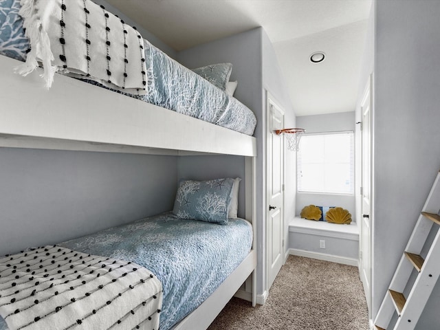 4138 Defender Ln, Galveston, TX 77554 - carpeted bedroom with baseboards