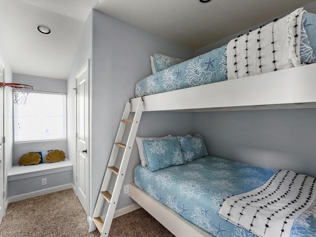 4138 Defender Ln, Galveston, TX 77554 - carpeted bedroom featuring baseboards