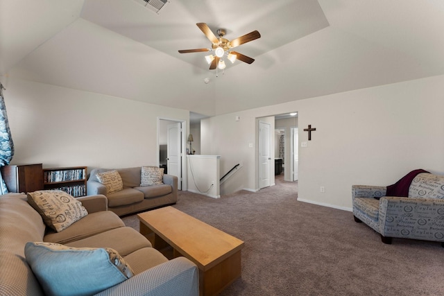 living area with carpet, vaulted ceiling, ceiling fan, baseboards, and visible vents