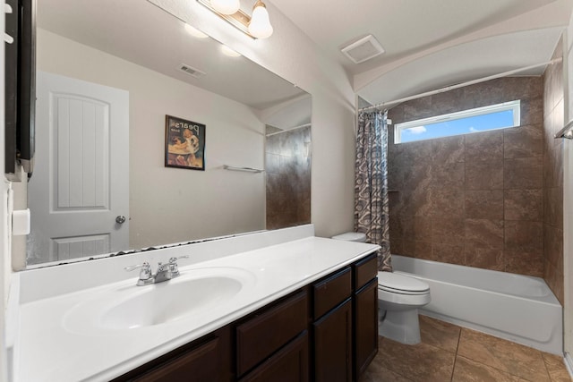 bathroom with tile patterned floors, shower / bath combo, toilet, vanity, and visible vents