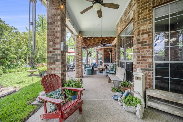 view of patio featuring a ceiling fan