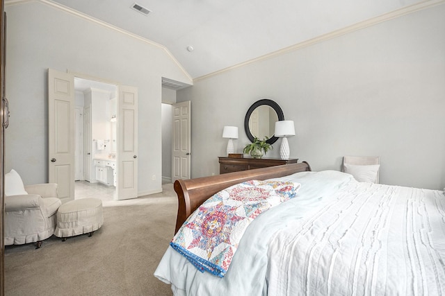 carpeted bedroom featuring lofted ceiling, visible vents, connected bathroom, and crown molding