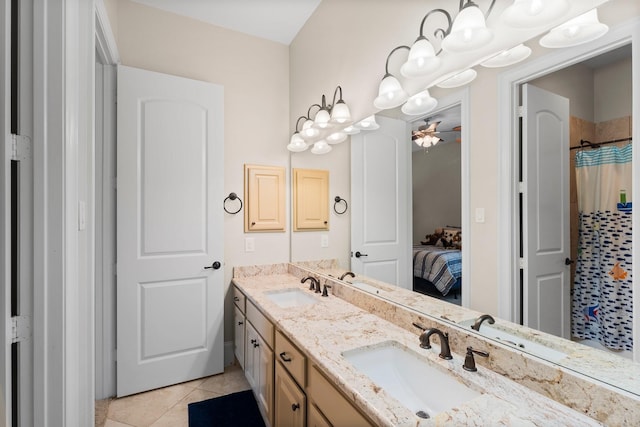 5006 Newport Ct, Spring, TX 77386 - bathroom featuring a sink, tile patterned floors, and double vanity