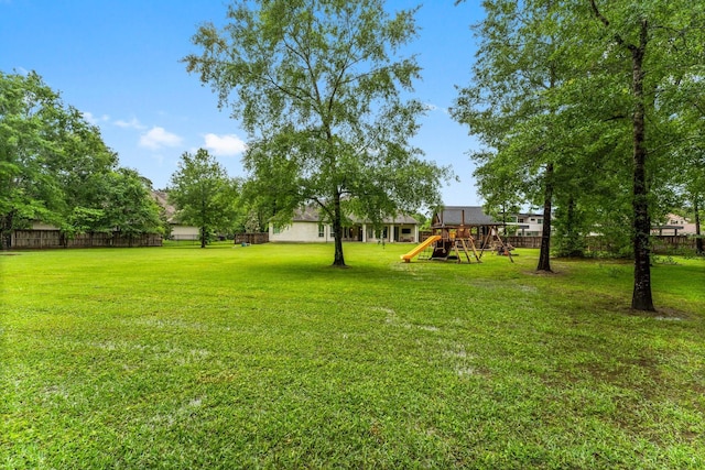 5006 Newport Ct, Spring, TX 77386 - view of yard with fence and a playground