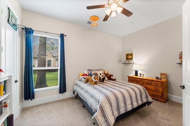 5006 Newport Ct, Spring, TX 77386 - bedroom with carpet floors, ceiling fan, and baseboards
