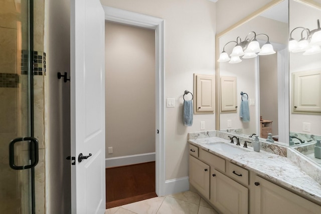 5006 Newport Ct, Spring, TX 77386 - bathroom with vanity, baseboards, a stall shower, and tile patterned floors