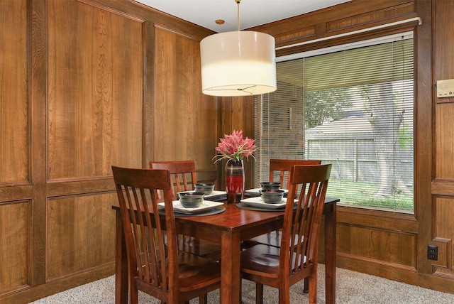 710 Alyse St, Deer Park, TX 77536 - carpeted dining room featuring wood walls