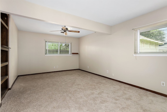 710 Alyse St, Deer Park, TX 77536 - unfurnished room featuring light colored carpet, ceiling fan, and baseboards