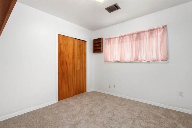 710 Alyse St, Deer Park, TX 77536 - carpeted spare room with visible vents and baseboards