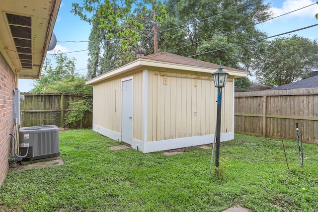 710 Alyse St, Deer Park, TX 77536 - view of shed featuring central AC and a fenced backyard