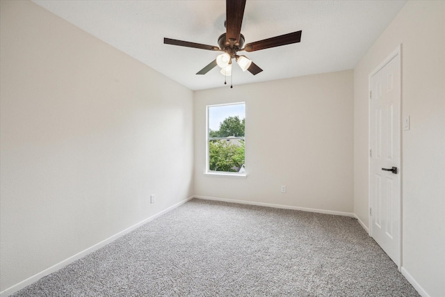 unfurnished bedroom with baseboards, a ceiling fan, and carpet flooring