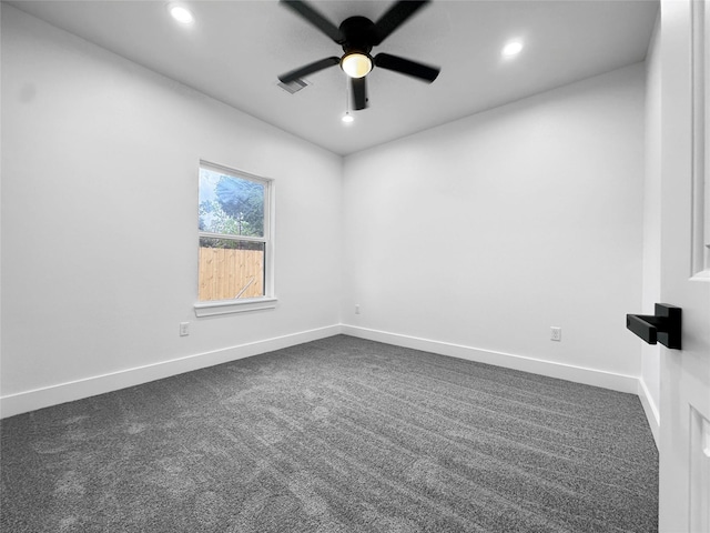 empty room with recessed lighting, dark colored carpet, and a ceiling fan