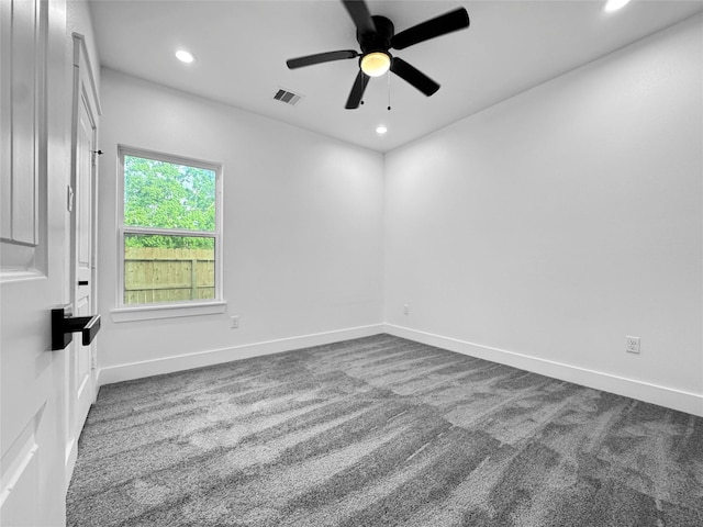 carpeted empty room featuring baseboards, visible vents, a ceiling fan, and recessed lighting