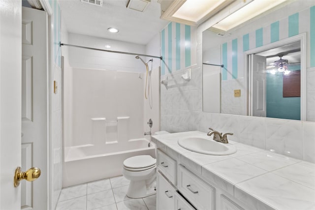 1114 Helen Dowdy Prt, Bolivar, TX 77650 - full bathroom featuring toilet, vanity, shower / washtub combination, wallpapered walls, and a ceiling fan