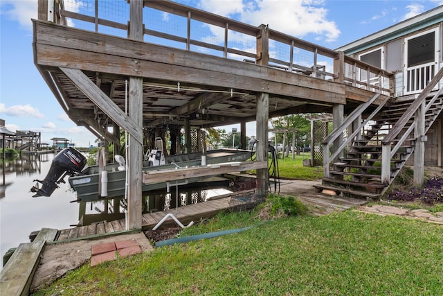 1114 Helen Dowdy Prt, Bolivar, TX 77650 - dock with boat lift, a yard, and stairs