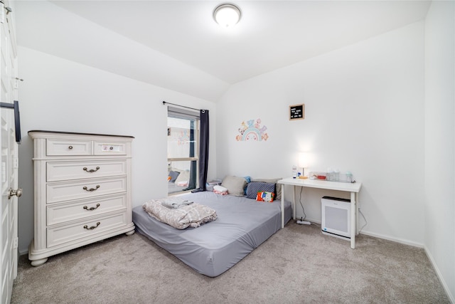 10554 Cecilia Star Ln, Richmond, TX 77406 - bedroom featuring lofted ceiling, light colored carpet, and baseboards