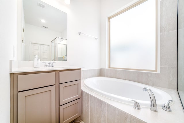 10554 Cecilia Star Ln, Richmond, TX 77406 - full bath with a garden tub, vanity, and a shower stall