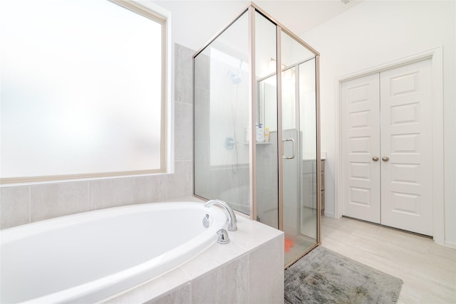10554 Cecilia Star Ln, Richmond, TX 77406 - full bath featuring a bath and a stall shower