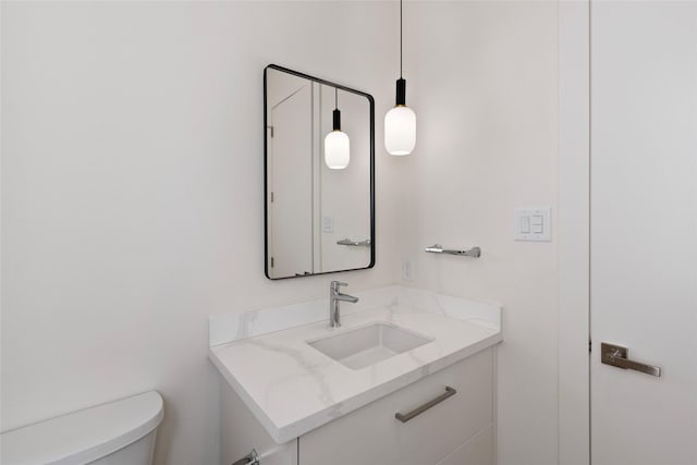half bath with toilet and vanity