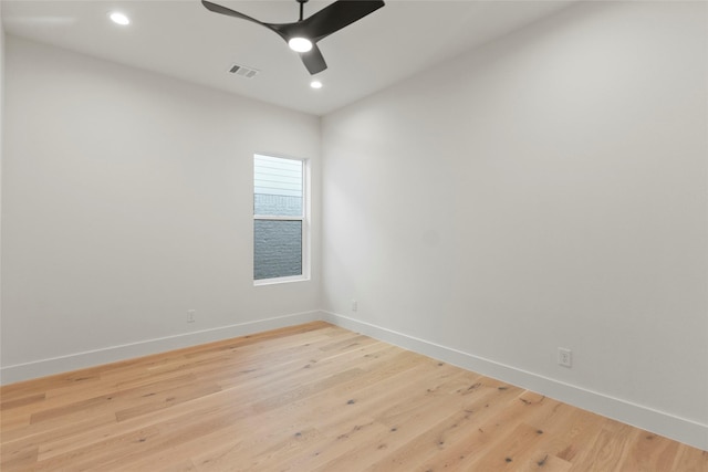 spare room with light wood-style flooring, visible vents, baseboards, recessed lighting, and a ceiling fan